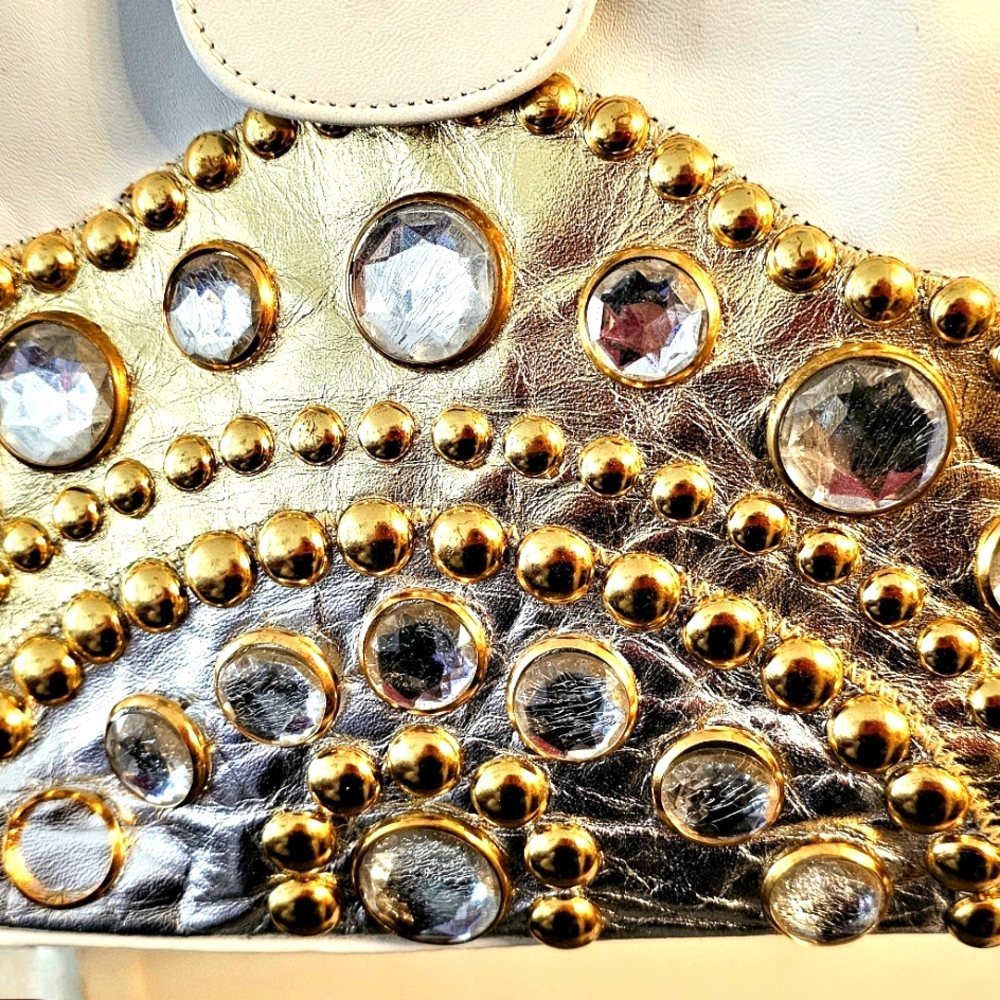 WHITE GENUINE LEATHER CLUTCH HANDBAG WITH GOLD & SILVER DESIGN ON FRONT..